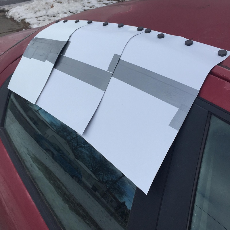 cover a broken car window from rain