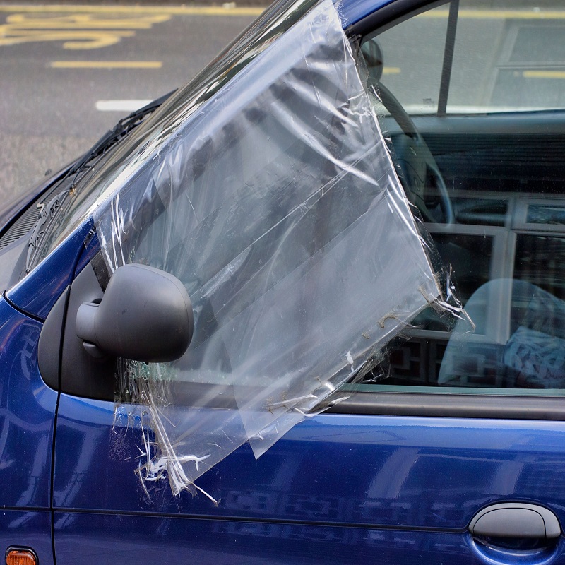 cover a broken car window from rain